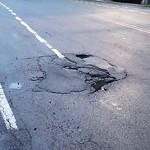 Pothole at Newton St @ Arlington Rd