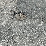 Pothole at 66–106 Davis Ave