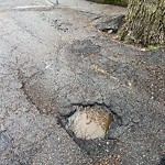 Pothole at 50–54 Upland Rd