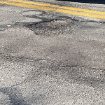 Pothole at 287 Kent St