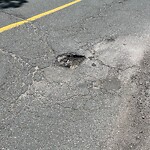Pothole at 60–70 Netherlands Rd