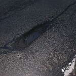 Pothole at 63–77 Goddard Ave