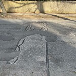 Pothole at 106 Crafts Rd, Chestnut Hill
