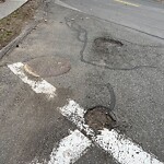 Pothole at 142 Crafts Rd, Chestnut Hill