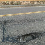 Pothole at 63–77 Goddard Ave