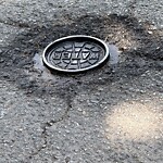 Pothole at 141–199 Sewall Ave