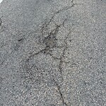Pothole at 100–150 Heath St, Chestnut Hill