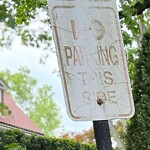 Damaged Sign at 82 Evans Rd