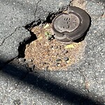 Pothole at 105 Naples Rd