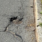 Pothole at 260–276 Saint Paul St