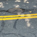 Pothole at 260–276 Saint Paul St