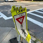 Damaged Sign at 230 Saint Paul St